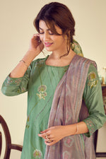 Load image into Gallery viewer, Sea Green Pure Muslin Jacquard Straight Cut Salwar Suit with Fancy Brush Print &amp; Embroidery
