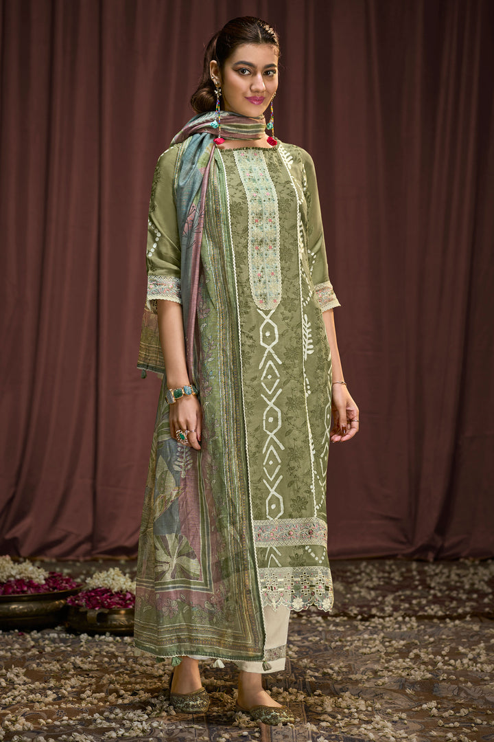 Pure Moga Silk Embroidery And Batik Print Long Dress In Green Color