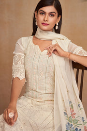 Pure Bemberg Georgette Fabric Beige Color Embroidered Festive Wear Stylish Straight Cut Salwar Suit