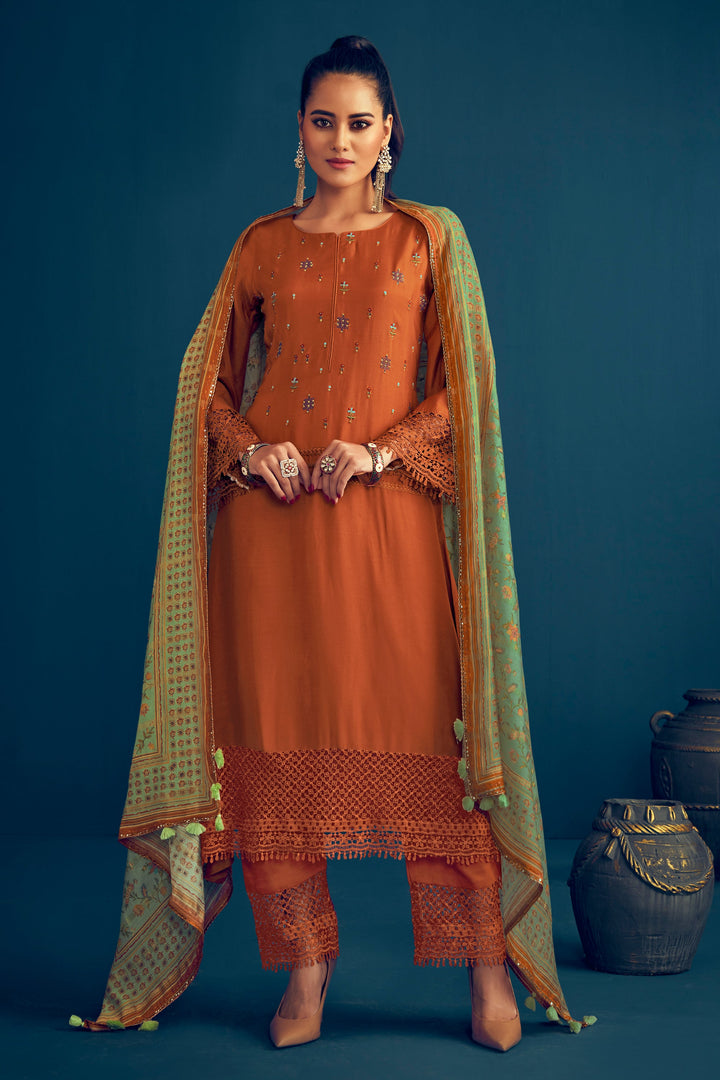 Rust Color Pure Muga Silk Borer Embroidered Unstitched Salwar Suit set